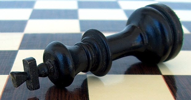 black king checkmated by queen-rook combo